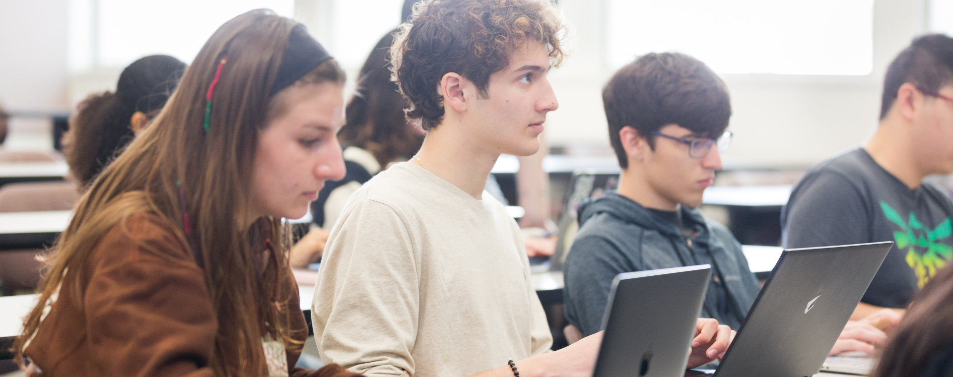 students work on a coding project during a computer science course at LMU